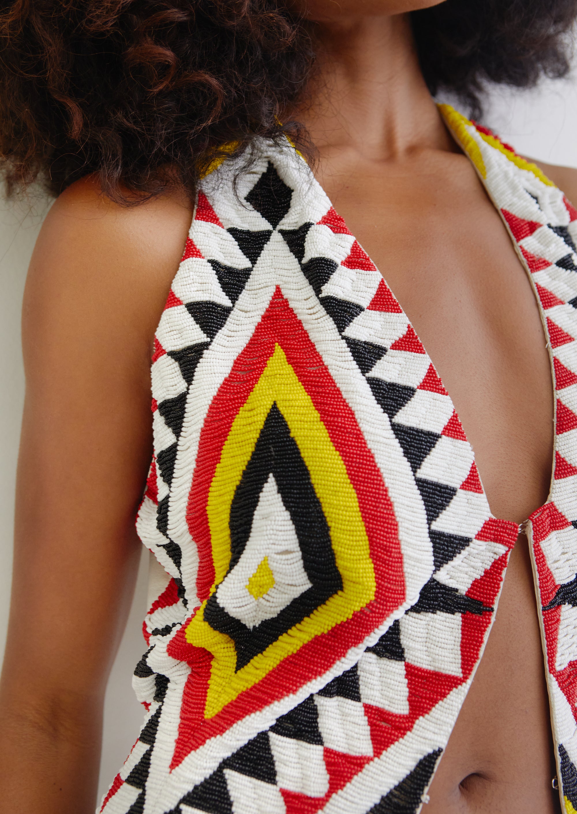 Norma Kamali <br> 70's Navajo hand beaded silk & leather waistcoat