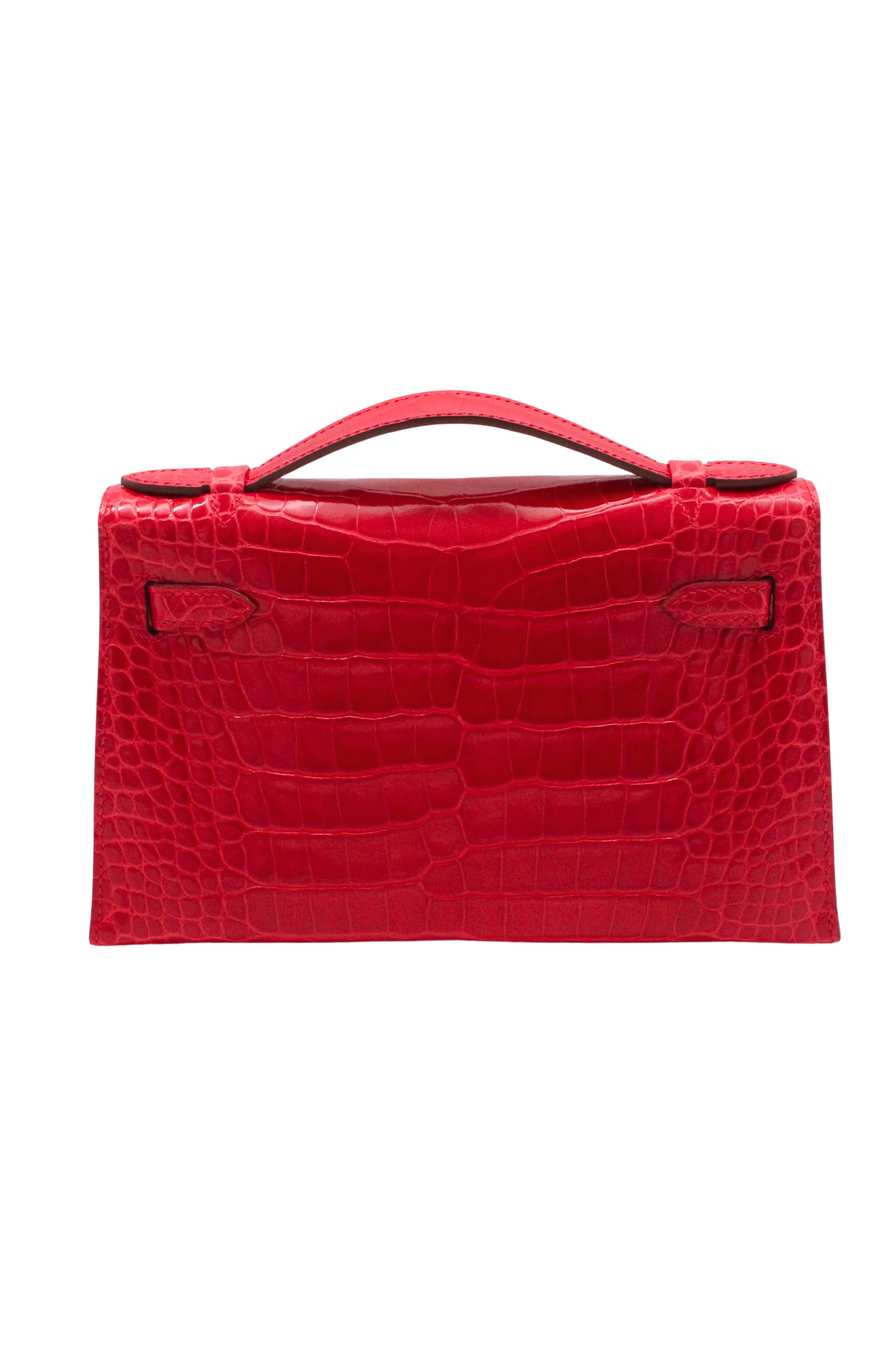 Hermès Paris <br> 2017 Kelly Pochette in Braise Alligator with gold hardware & full set