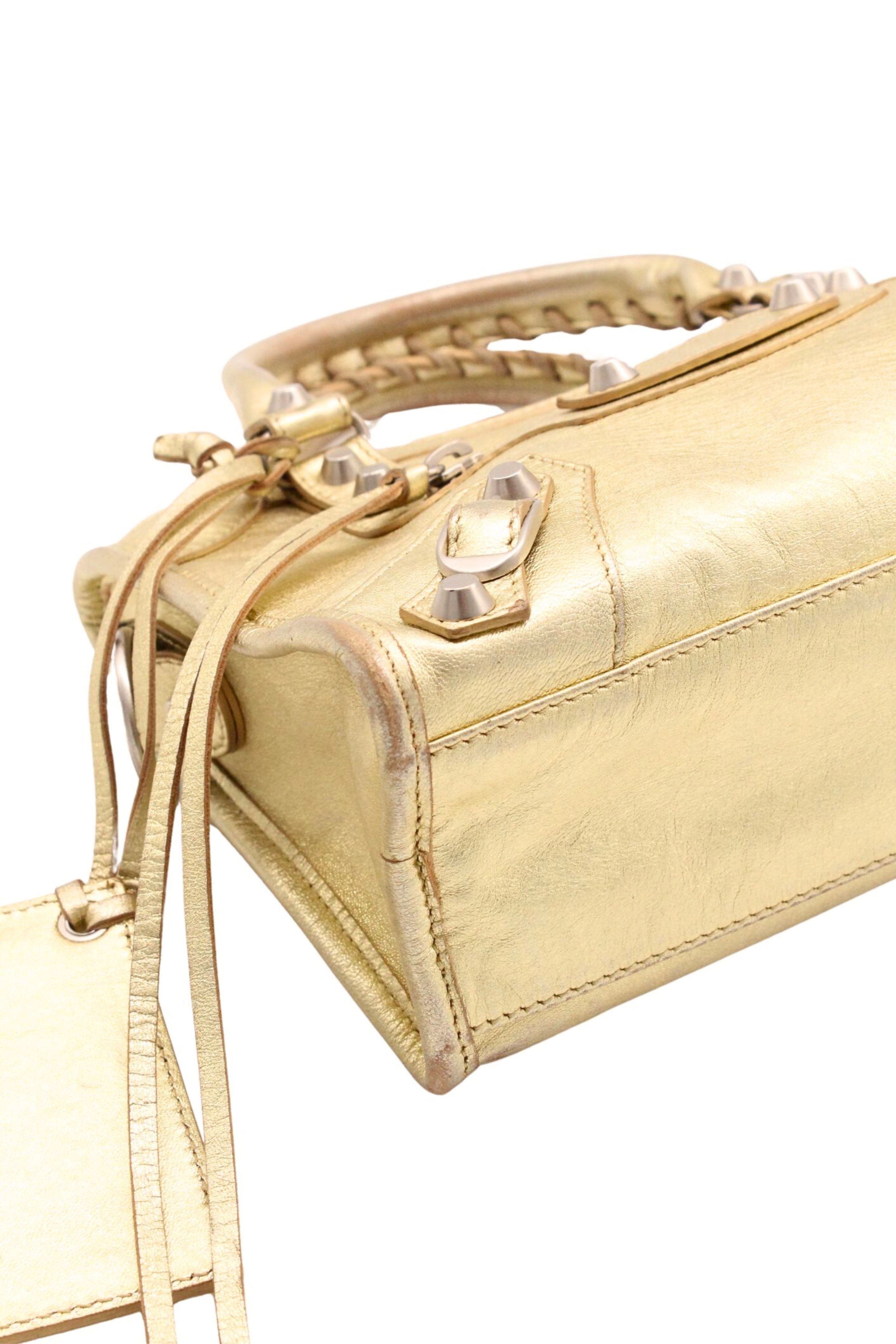 Balenciaga <br> 2000's metallic gold leather City Mini bag
