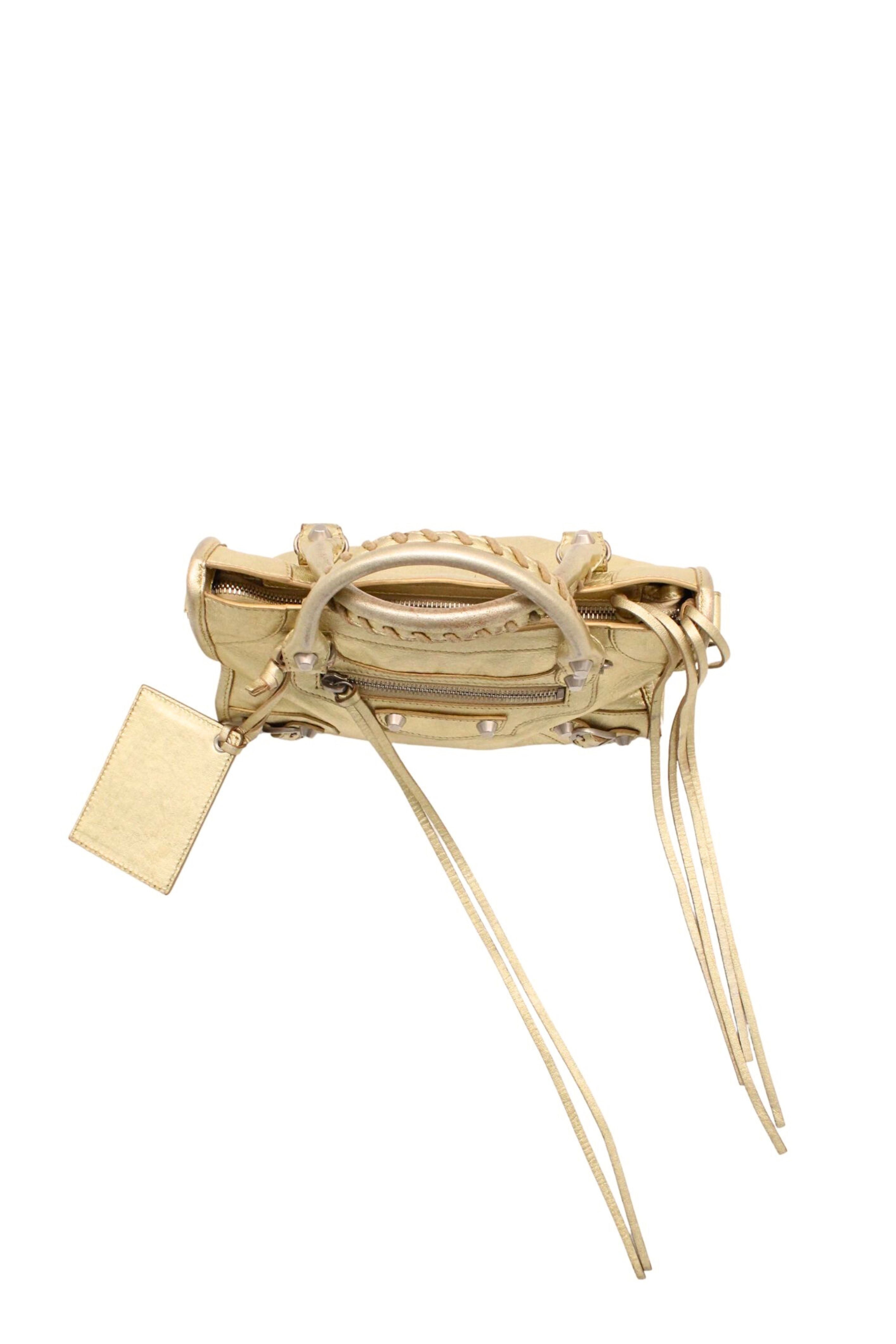 Balenciaga <br> 2000's metallic gold leather City Mini bag