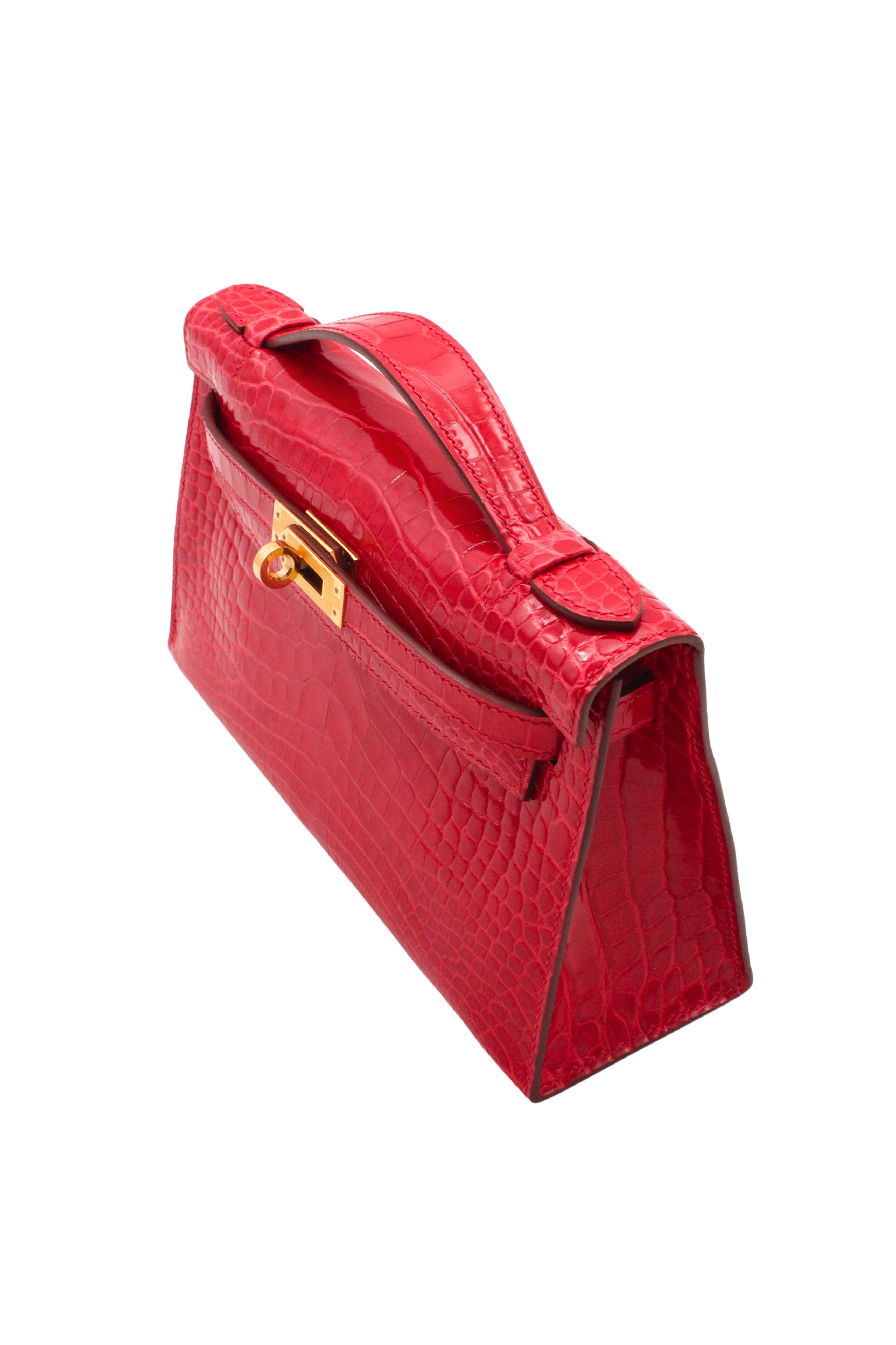 Hermès Paris <br> 2017 Kelly Pochette in Braise Alligator with gold hardware & full set