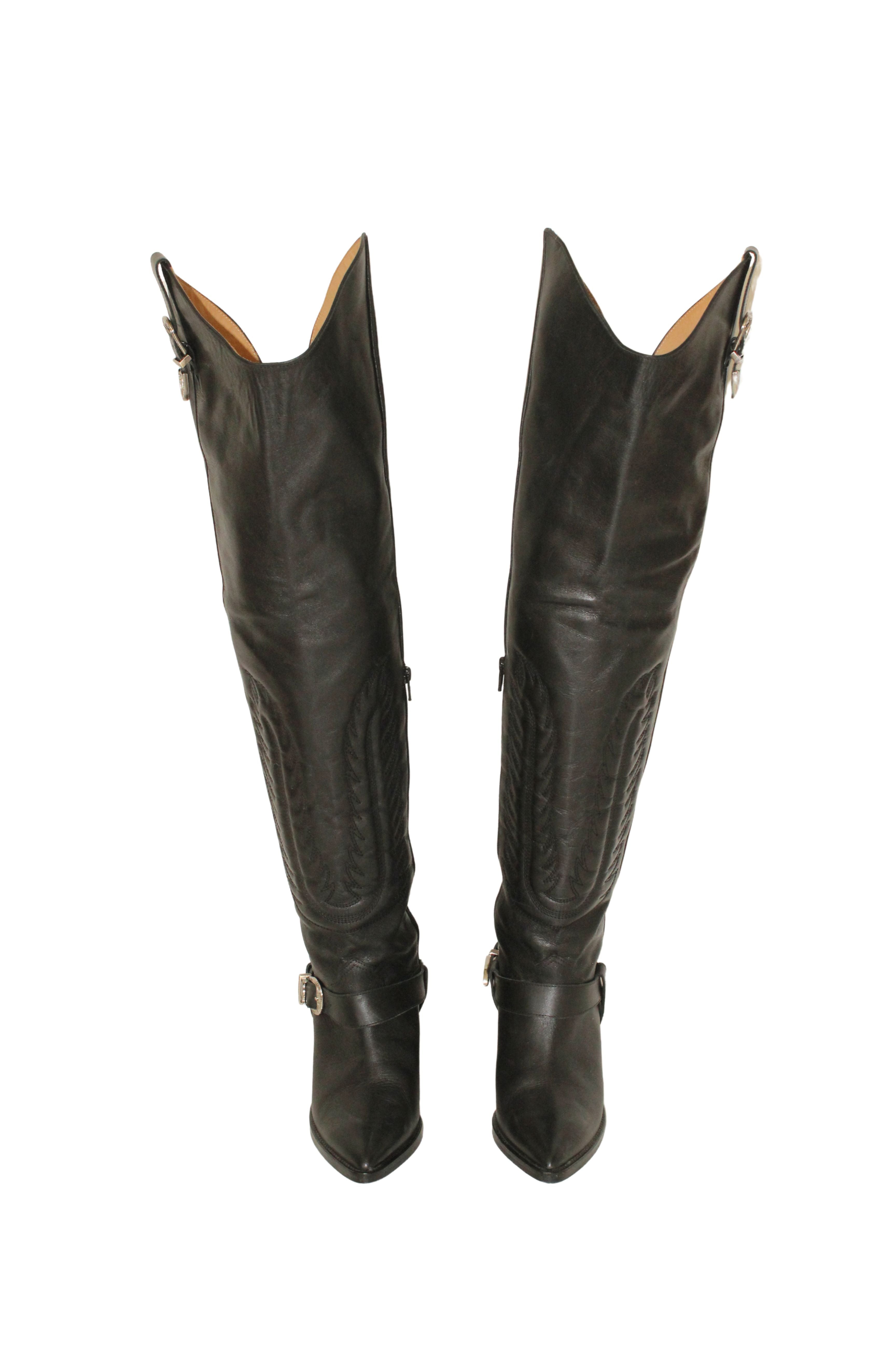 Toga Pulla <br> Thigh high leather cowboy boots with silver hardware