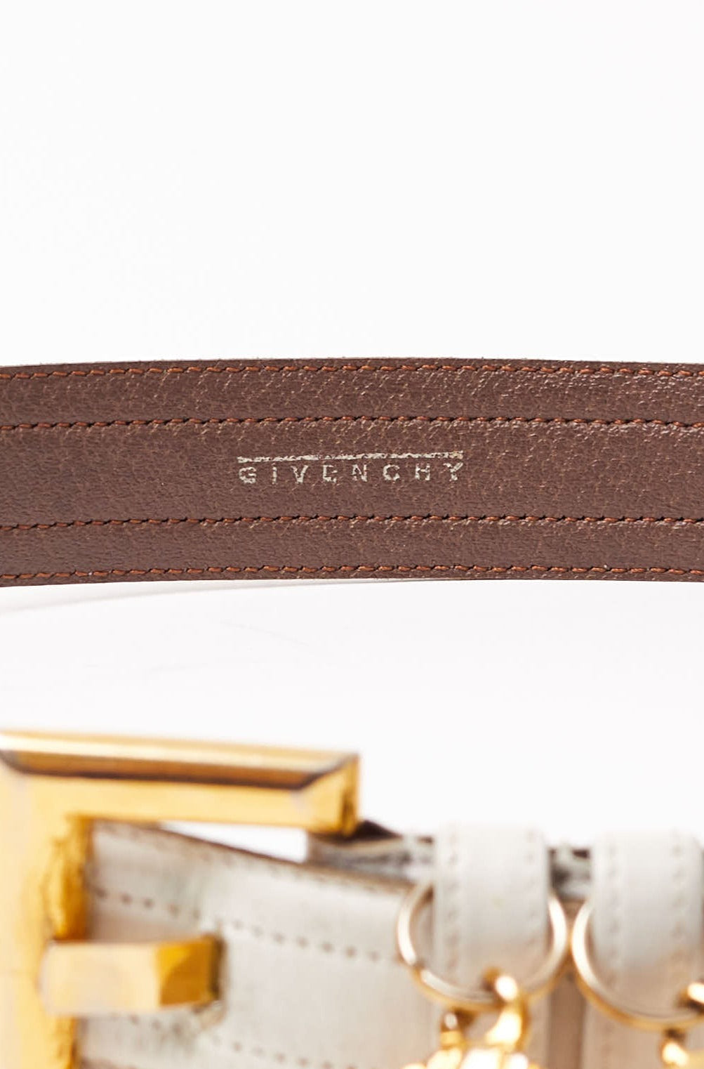 Givenchy <br> 80's leather belt with dangling logo medallions