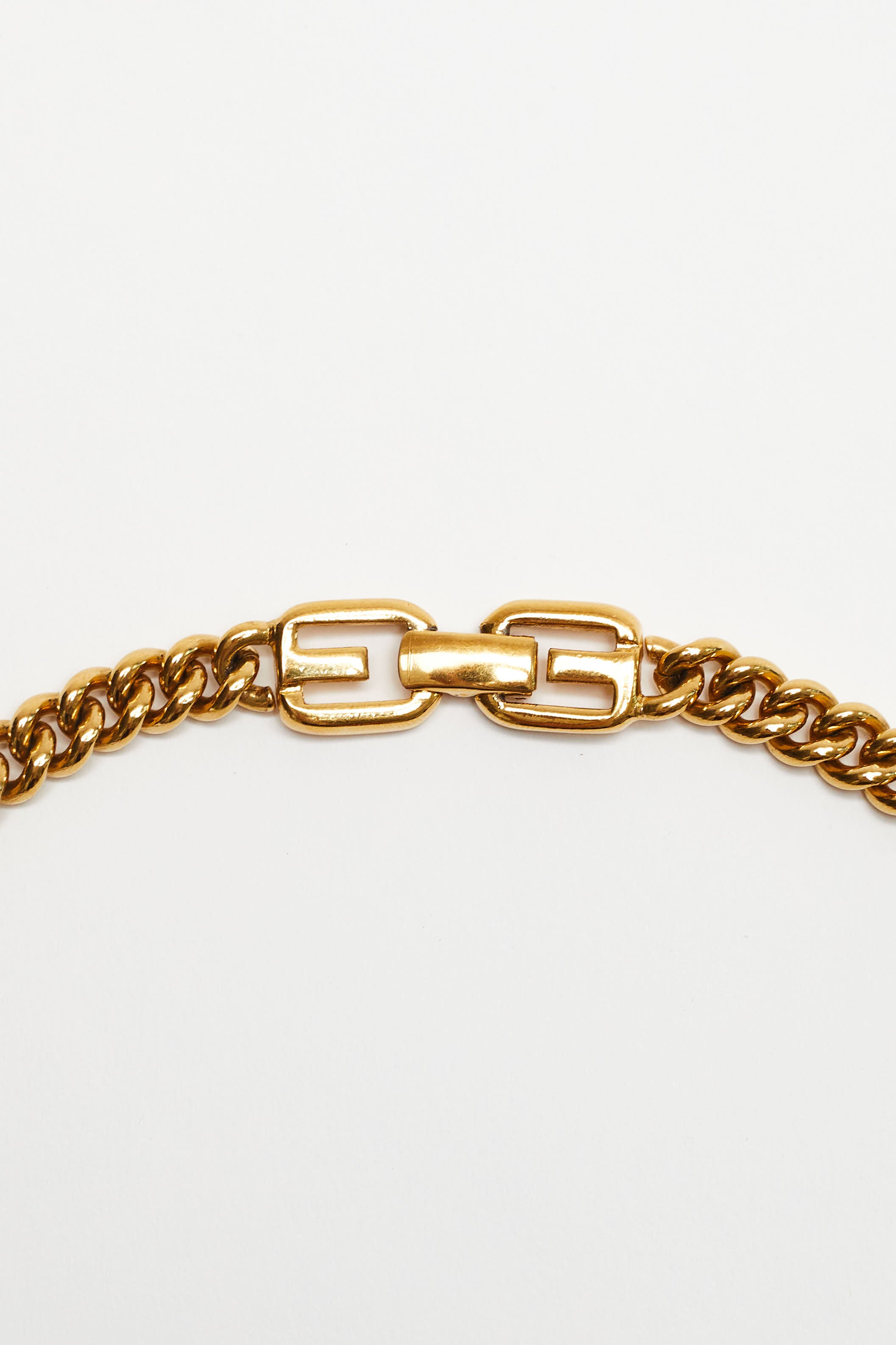 Givenchy <br> 80's crystal studded gold logo pendant necklace